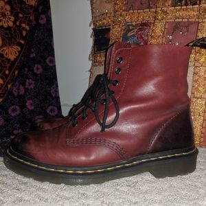burgundy and black Dr. Marten's boots